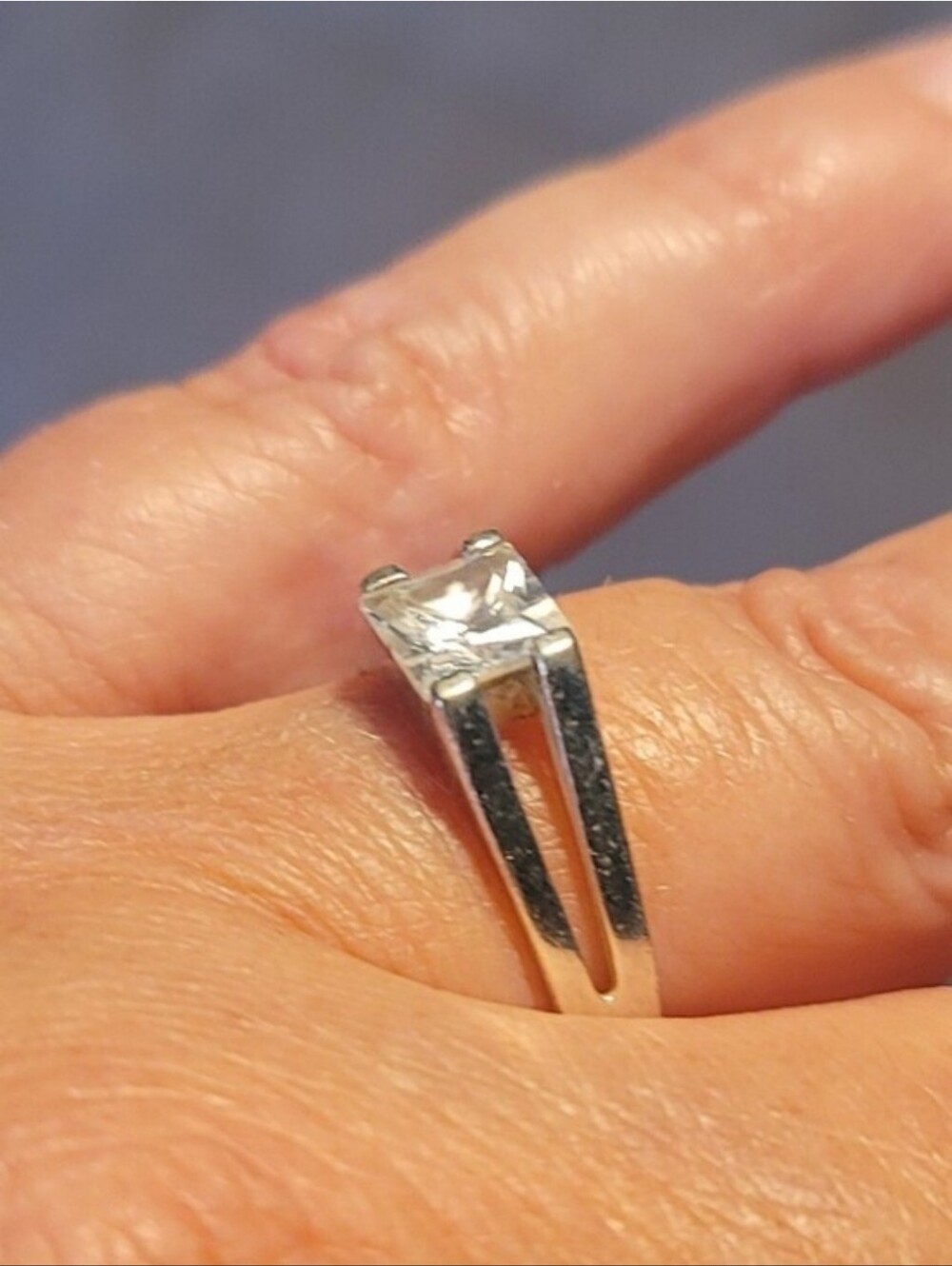 925 Sterling Silver Prominent Emerald-cut center stone Size 7.5